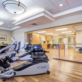 A well-equipped gym area for rehabilitation and fitness activities.
