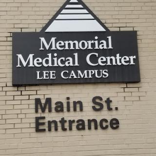 Sign indicating the main entrance to Memorial Medical Center, Lee Campus.