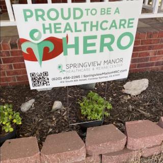 A sign expressing pride in healthcare heroes at Springview Manor.