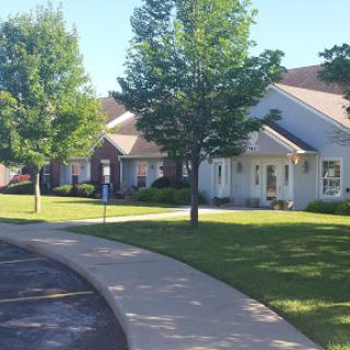 A peaceful suburban neighborhood featuring well-maintained homes and lush greenery.