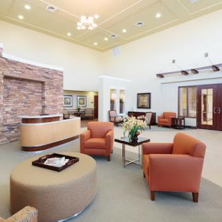 A modern and inviting lobby featuring comfortable seating and stylish dcor.