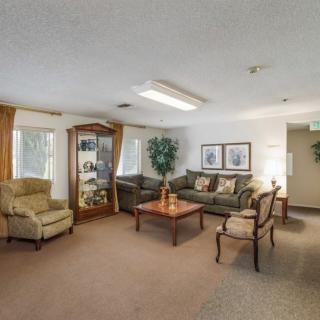 A cozy living room with comfortable seating and tasteful decor.