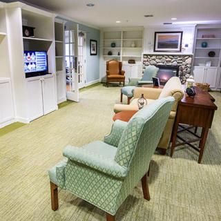 A cozy living room with comfortable seating and a television.