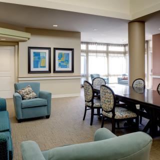A modern living room with comfortable furniture and stylish decor.