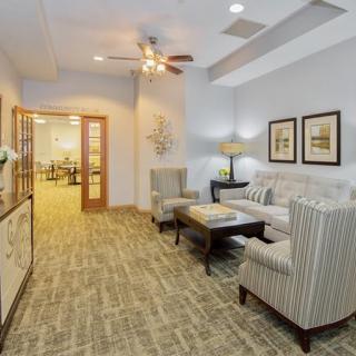 A cozy living room with comfortable seating and tasteful decor.