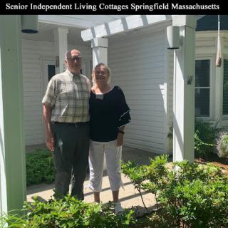 A couple poses together at a senior independent living cottage in Springfield, Massachusetts.