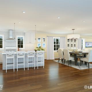 A beautifully designed open-concept kitchen and dining area featuring modern aesthetics and warm wooden floors.
