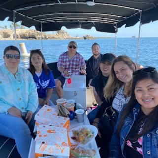 A fun day out on the water with friends enjoying snacks and great company.