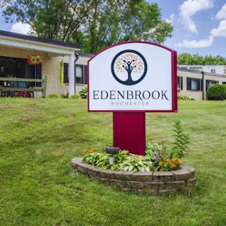 A welcoming sign for Edenbrook, surrounded by a well-maintained landscape.