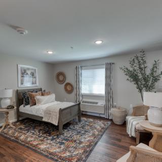 A cozy and modern bedroom with elegant decor.