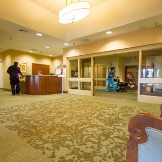 A modern lobby showcasing a reception area with elegant furnishings and inviting decor.
