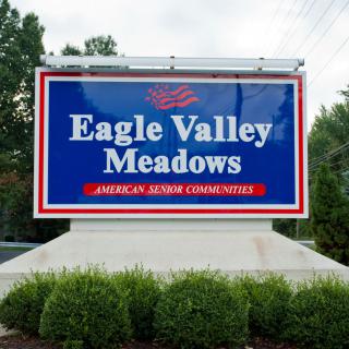 Sign for Eagle Valley Meadows, an American Senior Communities nursing home.