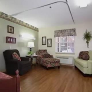 A cozy living room with comfortable seating and warm decor.