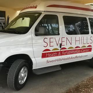 A van promoting Seven Hills Health & Rehabilitation Center, designed for patient transportation.