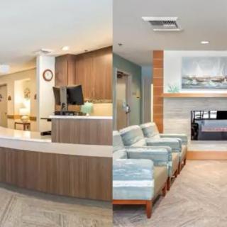 A modern reception and waiting area with sleek furniture and stylish decor.
