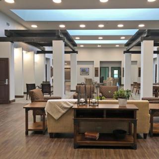 A modern and spacious interior lobby with comfortable seating and elegant decor.