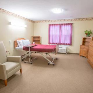 A clean and organized patient room in a healthcare facility.