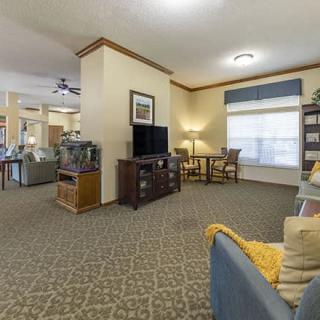 Spacious living room with comfortable seating and modern amenities.