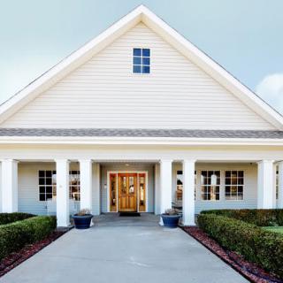 A suburban house with a welcoming front entrance.