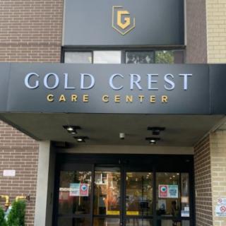 Entrance of Gold Crest Care Center with prominent signage.