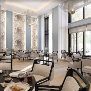 A modern and elegant dining area with ample natural light flooding through large windows.