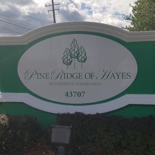 Entrance sign for Pine Ridge Estates community.