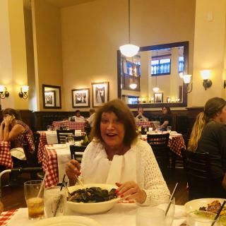 A person enjoying a meal at a restaurant.