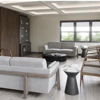 A modern living room featuring sleek furniture and a stylish interior design.