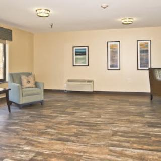 A spacious and welcoming lobby area featuring comfortable seating and modern decor.