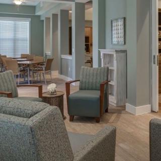 A cozy living room with comfortable seating and a stylish decor.