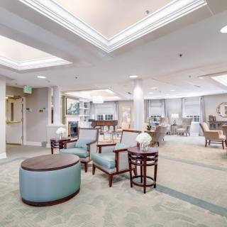 A spacious and elegantly designed lobby with comfortable seating and modern decor.