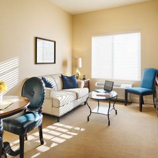 A bright and cozy living room with elegant furniture and decor.