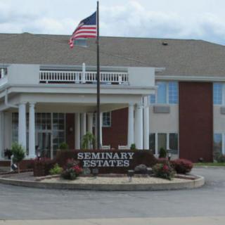 Entrance to Seminary Estates with American flag.