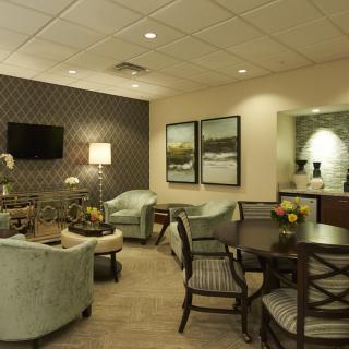 A modern living room with comfortable seating and stylish decor.