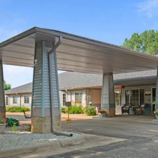 A building entrance with a covered canopy.