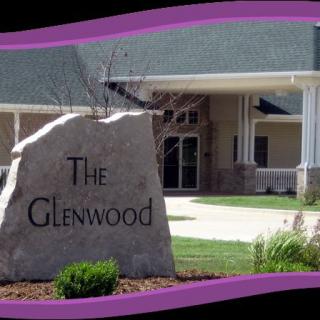 Entrance of The Glenwood with a stone sign.