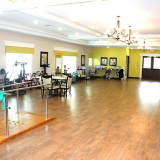 A spacious and elegantly designed lobby area featuring comfortable seating and decorative elements.