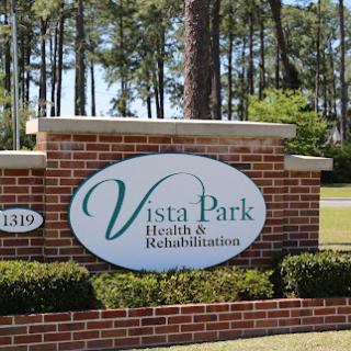 Welcome to Vista Park Health & Rehabilitation, a serene facility surrounded by nature.