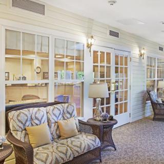 A cozy lobby area with comfortable seating and warm lighting.