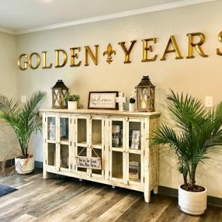 A cozy living room setup featuring decorative elements that celebrate the 'Golden Years'.