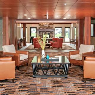 A modern lobby with comfortable seating and stylish decor.