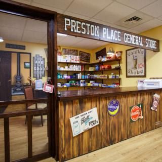 A nostalgic vintage general store interior with wooden counters and retro signage.