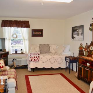 A cozy and inviting living room with traditional decor elements.