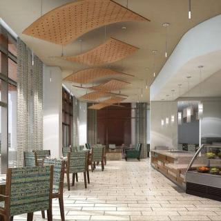 A modern cafe interior featuring stylish seating and contemporary design elements.