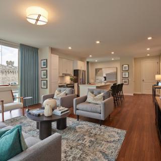 A beautifully designed modern living room featuring comfortable seating and elegant decor.