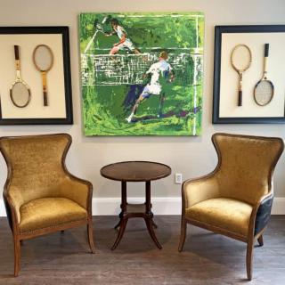 Tennis-themed interior with art and vintage decor.