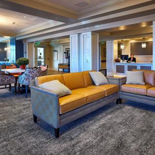 A modern lobby with comfortable seating and stylish decor.