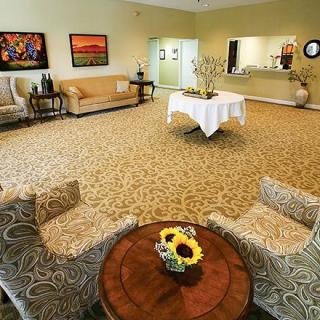 A spacious and elegantly decorated lobby with comfortable seating arrangements.