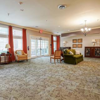 A spacious lobby with comfortable seating and elegant decor.