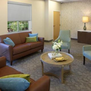 A cozy living room with comfortable seating and warm decor.